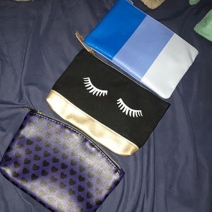 3 mini makeup bags.